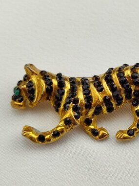 1950's Gold Tone Tiger Pin with Green and Black Rhinestones